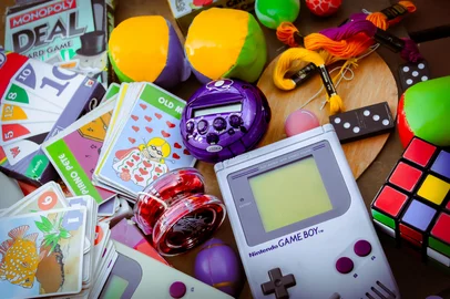 Minneapolis, USA - Sept 16, 2025: A collection of retro gaming, card, and puzzle items. For Editorial Use Only.<!-- NICAID(16142568) -->