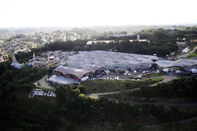 CAXIAS DO SUL, RS, BRASIL, 20/02/2024. 34ª Festa Nacional da Uva no Parque Mário Bernardino Ramos (Pavilhões da Festa da Uva). Passeio de helicóptero. Vistas aéreas de Caxias do Sul. (Porthus Junior/Agência RBS)<!-- NICAID(15685743) -->
