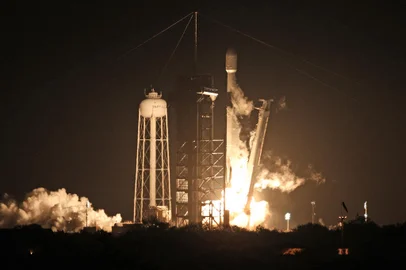 A SpaceX Falcon 9 rocket lifts off from launch pad LC-39A at the Kennedy Space Center with the Intuitive Machines' Nova-C moon lander mission, in Cape Canaveral, Florida, on February 15, 2024. The IM-1 mission is part of NASAs Commercial Lunar Payload Services (CLPS) program to understand more about the Moons surface ahead of the coming Artemis missions. Intuitive Machines' Odysseus lander would be the first US spacecraft to land on the moon in over 50 years. It is expected to land near the south pole of the moon on February 22. (Photo by Gregg Newton / AFP)<!-- NICAID(15679619) -->