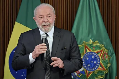 (FILES) Brazilian President Luiz Inacio Lula da Silva speaks during a ministerial meeting at Planalto Palace in Brasilia, on June 15, 2023. President Luiz Inacio Lula da Silva has been in diplomatic hyperdrive since taking office, making Brazil a key global player again -- but stoking controversy with some of his stances, including on Ukraine and Venezuela. Less than six months into his term, the veteran leftist has already met more foreign leaders than his predecessor, far-right ex-president Jair Bolsonaro, did in four years -- 33 to 32, according to a count by newspaper O Globo. (Photo by Evaristo SA / AFP)<!-- NICAID(15460980) -->