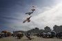 Capão da Canoa, RS, Brasil, 18-02-2024: Veranistas na beira da praia em tarde de sol e mar calmo em Capão da Canoa. Foto: Mateus Bruxel / Agência RBSIndexador: Mateus Bruxel<!-- NICAID(15682673) -->