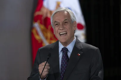 Chilean President Sebastian Pinera addresses the nation in Santiago, on November 17, 2019. - Chile said Friday it will hold a referendum to replace the country's dictatorship-era constitution -- a key demand of protesters after nearly a month of violent civil unrest. (Photo by CLAUDIO REYES / AFP)