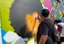 Com grafite, artista plástico e grupo de jovens dão vida ao muro da Mauá no South Summit
