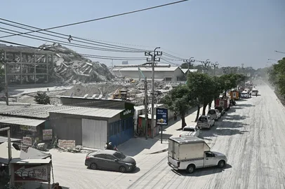 A collapsed building at a construction site is seen in Bangkok on March 28, 2025, after an earthquake. A powerful earthquake rocked central Myanmar on March 28, buckling roads in capital Naypyidaw, damaging buildings and forcing people to flee into the streets in neighbouring Thailand. (Photo by Lillian SUWANRUMPHA / AFP)<!-- NICAID(16005188) -->
