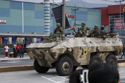 Ecuadorean soldiers in a tank patrol the street in downtown Quito on January 9, 2024, amid growing tension after Ecuadorean President Daniel Noboa declared the country in a state of "internal armed conflict" and ordered the army to carry out military operations against the country's powerful drug gangs. Ecuador's new president, 36-year-old Daniel Noboa, is grappling with a security nightmare after the escape from prison of one of the country's most high profile gangsters, Jose Adolfo Macias, known as "Fito." (Photo by Galo Paguay / AFP)<!-- NICAID(15646235) -->