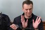 (FILES) Kremlin critic Alexei Navalny, who was arrested during March 26 anti-corruption rally, gestures during an appeal hearing at a court in Moscow on March 30, 2017. Russian opposition leader Alexei Navalny died on February 16, 2024 at the Arctic prison colony where he was serving a 19-year-term, Russia's federal penitentiary service said in a statement. (Photo by Kirill KUDRYAVTSEV / AFP)<!-- NICAID(15681069) -->