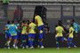 Brazilian players celebrate a goal scored by teammate defender Marquinhos (covered) during the 2026 FIFA World Cup South American qualifiers football match between Peru and Brazil, at the Nacional stadium in Lima, on September 12, 2023. (Photo by CRIS BOURONCLE / AFP)<!-- NICAID(15538887) -->
