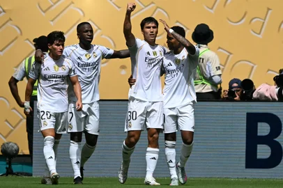 Real Madrid's Spanish forward #30 Gonzalo Garcia celebrates after scoring with teammates Spanish defender #20 Francisco Garcia, Brazilian forward #07 Vinicius Junior and Brazilian forward #11 Rodrygo during the FIFA Club World Cup 2025 Group H football match between Spain's Real Madrid and Saudi's Al-Hilal at the Hard Rock stadium in Miami on June 18, 2025. (Photo by PATRICIA DE MELO MOREIRA / AFP)<!-- NICAID(16063027) -->