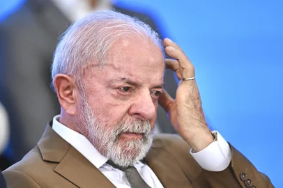 Brazils President Luis Inacio Lula da Silva gestures during a ceremony announcing investments in Parana State, at Planalto Palace in Brasilia, on March 12, 2026. (Photo by Evaristo Sa / AFP)<!-- NICAID(16244699) -->
