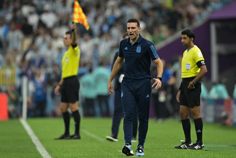 Argentina's coach Lionel Scaloni reacts on the touchline during the Qatar 2022 World Cup football semi-final match between Argentina and Croatia at Lusail Stadium in Lusail, north of Doha on December 13, 2022. (Photo by JUAN MABROMATA / AFP)<!-- NICAID(15294704) -->