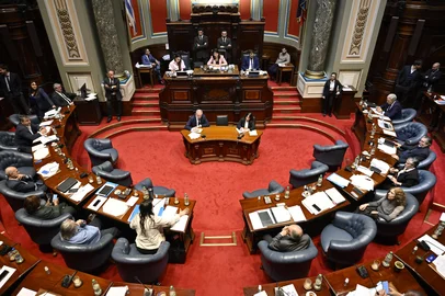 Senators debate a euthanasia bill at the Legislative Palace in Montevideo on October 15, 2025. (Photo by Santiago Mazzarovich / AFP)<!-- NICAID(16146678) -->
