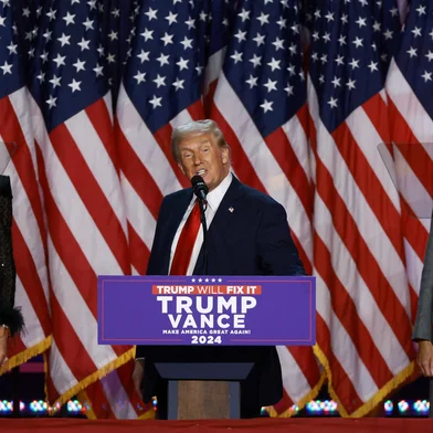 WEST PALM BEACH, FLORIDA - NOVEMBER 06: Republican presidential nominee, former U.S. President Donald Trump speaks during an election night event at the Palm Beach Convention Center on November 06, 2024 in West Palm Beach, Florida. Americans cast their ballots today in the presidential race between Republican nominee former President Donald Trump and Vice President Kamala Harris, as well as multiple state elections that will determine the balance of power in Congress.   Joe Raedle/Getty Images/AFP (Photo by JOE RAEDLE / GETTY IMAGES NORTH AMERICA / Getty Images via AFP)<!-- NICAID(15908056) -->
