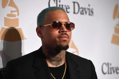 (FILES) In this file photo taken on February 7, 2015 US rapper Chris Brown attends the Pre-GRAMMY Gala at The Beverly Hilton Hotel in Beverly Hills, California. - US rapper Chris Brown is detained in Paris after a rape claim, security sources told on January 22, 2019. (Photo by Jason Merritt / GETTY IMAGES NORTH AMERICA / AFP)<!-- NICAID(13925743) -->