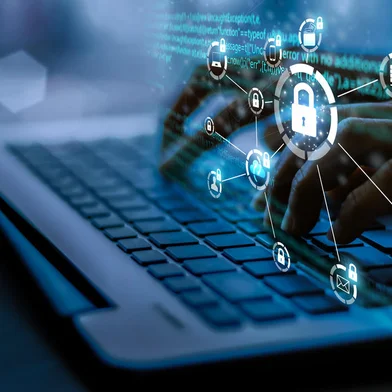 Business, technology, internet and networking concept. Young businesswoman working on his laptop in the office, select the icon security on the virtualFonte: 480014312<!-- NICAID(15033648) -->