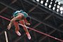 Brazil's Thiago Braz competes in the men's pole vault qualification during the Tokyo 2020 Olympic Games at the Olympic Stadium in Tokyo on July 31, 2021. (Photo by Ben STANSALL / AFP)Editoria: SPOLocal: TokyoIndexador: BEN STANSALLSecao: athletics, track and fieldFonte: AFPFotógrafo: STF<!-- NICAID(14850433) -->