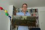 An handout picture released by Dutch art detective Arthur Brand shows a portrait of him posing with the painting title "Parsonage Garden at Nuenen in Spring", painted by Vincent van Gogh in 1884, at his home in Amsterdam on September 11, 2023. Brand has recovered a precious Vincent van Gogh painting that was stolen from a museum in a daring midnight heist during the coronavirus lockdown three-and-a-half years ago. Brand, dubbed the "Indiana Jones of the Art World" for tracing a series of high-profile lost artworks, told AFP that confirming the painting was the stolen Van Gogh was "one of the greatest moments of my life." (Photo by Handout / ARTHUR BRAND / AFP) / RESTRICTED TO EDITORIAL USE - MANDATORY CREDIT "AFP PHOTO /Arthur Brand " - NO MARKETING NO ADVERTISING CAMPAIGNS - DISTRIBUTED AS A SERVICE TO CLIENTSEditoria: ACELocal: AmsterdamIndexador: HANDOUTSecao: paintingFonte: ARTHUR BRANDFotógrafo: Handout<!-- NICAID(15538052) -->