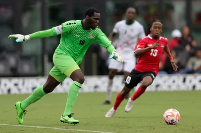 FORT LAUDERDALE, FLORIDA - JUNE 25: Julani Archibald #18 of Saint Kitts and Nevis kicks the ball against the Trinidad and Tobago during the second half at DRV PNK Stadium on June 25, 2023 in Fort Lauderdale, Florida.   Megan Briggs/Getty Images/AFP (Photo by Megan Briggs / GETTY IMAGES NORTH AMERICA / Getty Images via AFP)<!-- NICAID(15466572) -->