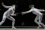 Brazil's Nathalie Moellhausen (R) compete against Italy's Rossella Fiamingo in the womens individual epee qualifying bout during the Tokyo 2020 Olympic Games at the Makuhari Messe Hall in Chiba City, Chiba Prefecture, Japan, on July 24, 2021. (Photo by Mohd RASFAN / AFP)Editoria: SPOLocal: ChibaIndexador: MOHD RASFANSecao: sports eventFonte: AFPFotógrafo: STF<!-- NICAID(14843841) -->