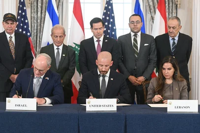 US Secretary of State Marco Rubio (C, back) looks on as (L/R, front row) Israeli Ambassador to the US Yechiel Leiter, State Department Chief of Staff Daniel Holler, and Lebanese Ambassador to the US Nada Hamadeh sign a framework agreement at the US Department of State in Washington, DC, on June 26, 2026. Lebanon, Israel and the United States on Friday signed a trilateral framework agreement aimed at paving the way for a peace deal between the two long-time Middle East adversaries. (Photo by SAUL LOEB / AFP)<!-- NICAID(16315208) -->