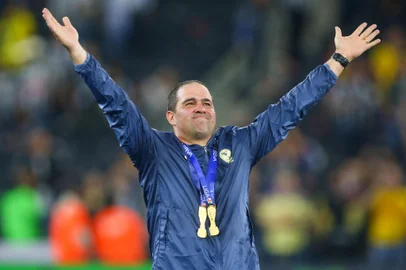 America's Brazilian coach Andre Jardine celebrates after the Liga MX Apertura tournament final second-leg football match between Monterrey and America at the BBVA Stadium in Monterrey, Nuevo Leon State, Mexico on December 15, 2024. (Photo by Julio Cesar AGUILAR / AFP)<!-- NICAID(15936372) -->