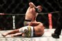 SP - UFC/SÃO PAULO - ESPORTES - O lutador Thiago Tavares luta contra Khabib Nurmagomedov (calção preto) durante o evento   UFC São Paulo, realizado em arena montada no ginásio do Ibirapuera, na noite de ontem   (19).   