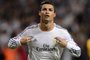 ALTERNATIVE CROPReal Madrid's Portuguese forward Cristiano Ronaldo celebrates after scoring during the UEFA Champions League Group B football match Real Madrid CF vs Juventus at the Santiago Bernabeu stadium in Madrid on October 23, 2013.   AFP PHOTO / DANI POZO