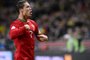 Portugal's forward Cristiano Ronaldo celebrates after scoring during the FIFA 2014 World Cup playoff football match Sweden vs Portugal at the Friends Arena in Solna near Stockholm on November 19, 2013 . AFP PHOTO/ JONATHAN NACKSTRAND