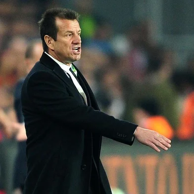 Brazil`s head coach Carlos Caetano Bledorn Verri Dunga gestures during the friendly football match Turkey  vs Brazil on November 12, 2014 at Fenerbahce Sukru Saracoglu stadium in Istanbul. AFP PHOTO/OZAN KOSE