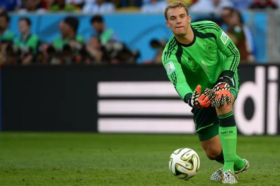 491717433Germany's goalkeeper Manuel Neuer clear the ball during the 2014 FIFA World Cup final football match between Germany and Argentina at the Maracana Stadium in Rio de Janeiro, Brazil, on July 13, 2014.  AFP PHOTO / PEDRO UGARTE Germany's midfielder Toni Kroos (L) and Argentina's midfielder Lucas Biglia vie for the ball during the 2014 FIFA World Cup final football match between Germany and Argentina at the Maracana Stadium in Rio de Janeiro, Brazil, on July 13, 2014.  AFP PHOTO / PEDRO UGARTE Argentina's forward and captain Lionel Messi vies with Germany's midfielder Bastian Schweinsteiger (R) during the 2014 FIFA World Cup final football match between Germany and Argentina at the Maracana Stadium in Rio de Janeiro on July 13, 2014.  AFP PHOTO / JUAN MABROMATA Germany's midfielder Christoph Kramer (R) tackles Argentina's midfielder Javier Mascherano during the final football match between Germany and Argentina for the FIFA World Cup at The Maracana Stadium in Rio de Janeiro on July 13, 2014. AFP PHOTO / GABRIEL BOUYSEditoria: SPOLocal: Rio de JaneiroIndexador: PEDRO UGARTESecao: SoccerFonte: AFPFotógrafo: STF