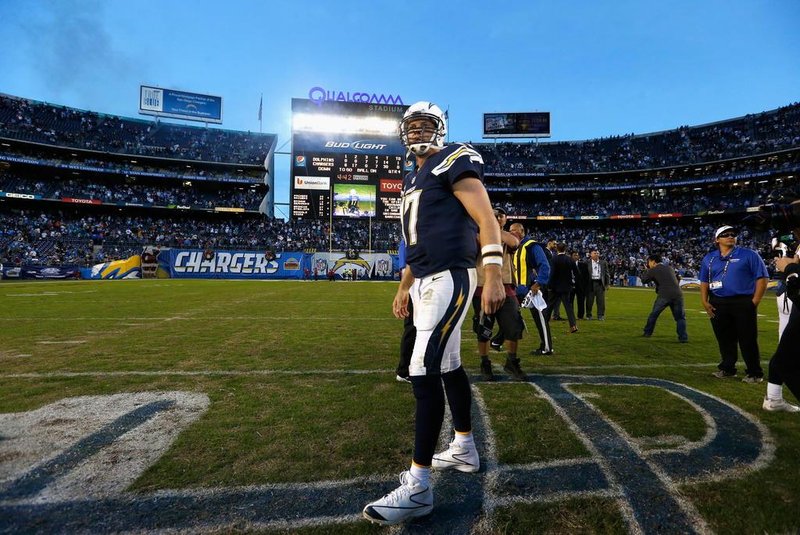 Miami Dolphins v San Diego ChargersSAN DIEGO, CA - DECEMBER 20: Philip Rivers #17 of the San Diego Chargers walks off after the San Diego Chargers defeated the Miami Dolphins 30-14 at Qualcomm Stadium on December 20, 2015 in San Diego, California.   Sean M. Haffey/Getty Images/AFPEditoria: SPOLocal: San DiegoIndexador: Sean M. HaffeySecao: American FootballFonte: GETTY IMAGES NORTH AMERICAFotógrafo: STF