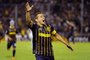 Marco Ruben of Argentinas Rosario Central celebrates a goal against Uruguays River Plate during their Libertadores Cup 2016 football match at the Gigante de Arroyito stadium in Rosario, Santa Fe, Argentina on March 9, 2016. AFP PHOTO STRINGER / AFP