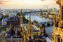 The view from Victoria Tower of the Houses of Parliament, the River Thames, Westminster and Westminster Bridge, to the Millennium Wheel and other landmarks in the evening as the light fades. This image must be reproduced with the credit 'VistBritain/Andrew Pickett'