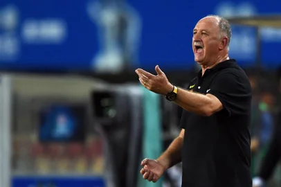 Guangzhou Evergrandes Brazilian head coach Luiz Felipe Scolari Felipão reacts during a friendly football match between Guangzhou Evergrande and Bayern Munich in Guangzhou on July 23, 2015.  AFP PHOTO / JOHANNES EISELE