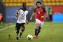 Egypt's forward Mohamed Salah (R) challenges Ghana's defender Harrison Afful during the 2017 Africa Cup of Nations group D football match between Egypt and Ghana in Port-Gentil on January 25, 2017. Justin TALLIS / AFP