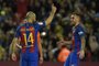 Barcelonas Argentinian defender Javier Mascherano (L) celebrates with Barcelonas forward Paco Alcacer (R) after scoring a penalty goal during the Spanish league football match FC Barcelona vs CA Osasuna at the Camp Nou stadium in Barcelona on April 26, 2017. / AFP PHOTO / LLUIS GENE