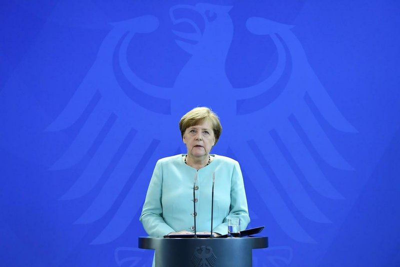 German Chancellor Angela Merkel gives a statement where she pledged more decisive action than ever on climate on June 2, 2017 at the Chancellery in Berlin, in reaction of the US Presidents decision to quit the Paris climate agreement.  
US President Donald Trump announced on June 1, 2017 that the United States is withdrawing from the Paris climate accord, prompting a furious global backlash and throwing efforts to slow global warming into doubt / AFP PHOTO / Tobias SCHWARZ