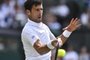 Serbia's Novak Djokovic returns against Slovakia's Martin Klizan during their men's singles first round match on the second day of the 2017 Wimbledon Championships at The All England Lawn Tennis Club in Wimbledon, southwest London, on July 4, 2017. / AFP PHOTO / Glyn KIRK / RESTRICTED TO EDITORIAL USE