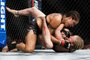 EDMONTON, AB - SEPTEMBER 09: Amanda Nunes, top, fights Valentina Shevchenko during UFC 215 at Rogers Place on September 9, 2017 in Edmonton, Canada.   Codie McLachlan/Getty Images/AFP
