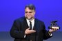 Director Guillermo Del Toro receives the Golden Lion for Best Film with the movie The Shape of Water during the award ceremony of the 74th Venice Film Festival on September 9, 2017 at Venice Lido.  / AFP PHOTO / Filippo MONTEFORTE