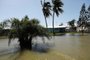 EVERGLADES CITY, FL - 11 DE SETEMBRO: Numerosas casas e estradas ficaram inundadas no dia seguinte ao furacão Irma varrido pela área em 11 de setembro de 2017 na Everglades City, Flórida. O furacão Irma fez outra partida perto de Nápoles ontem depois de inundar as Florida Keys. A eletricidade estava fora em grande parte da região com inundações extensas. Spencer Platt/Getty Images/AFP