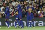 Barcelonas midfielder from Brazil Paulinho (R) celebrates with Barcelonas forward from Argentina Lionel Messi after scoring during the Spanish league football match FC Barcelona against SD Eibar at the Camp Nou stadium in Barcelona on September 19, 2017. / AFP PHOTO / PAU BARRENA