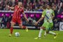 Bayern Munichs Dutch midfielder Arjen Robben (L) plays the ball during the German First division Bundesliga football match FC Bayern Munich vs VfL Wolfsburg in Munich, southern Germany, on September 22, 2017. / AFP PHOTO / Guenter SCHIFFMANN / RESTRICTIONS: DURING MATCH TIME: DFL RULES TO LIMIT THE ONLINE USAGE TO 15 PICTURES PER MATCH AND FORBID IMAGE SEQUENCES TO SIMULATE VIDEO. == RESTRICTED TO EDITORIAL USE == FOR FURTHER QUERIES PLEASE CONTACT DFL DIRECTLY AT + 49 69 650050
