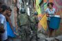  

Members of the police and the armed forces take part in an operation to fight heavily-armed drug traffickers at the Rocinha favela in Rio de Janeiro, Brazil, on September 22, 2017. 
Brazilian soldiers were sent to help Rio de Janeiro police fight heavily armed drug traffickers who have taken over much of the biggest shantytown in the country, the Rocinha favela. Local media reported intense shooting between police and criminals early Friday at Rocinha, where approximately 70,000 people live in a teeming collection of small homes on steep hillsides overlooking western Rio. / AFP PHOTO / Mauro PIMENTEL

Editoria: CLJ
Local: Rio de Janeiro
Indexador: MAURO PIMENTEL
Secao: police
Fonte: AFP
Fotógrafo: STF