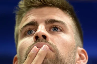 Barcelonas defender Gerard Pique gives a press conference at the FC Barcelona Sports Center Joan Gamper in Sant Joan Despi, near Barcelona, on September 17, 2013, on the eve of the UEFA Champions league football match FC Barcelona vs Ajax Amsterdam. AFP PHOTO / LLUIS GENE
