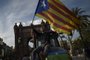 Supporters of Catalan independence drive with tractors through the Arc de Triomf (Triumphal Arch) in Barcelona on October 10, 2017. 
Spains worst political crisis in a generation will come to a head as Catalonias leader could declare independence from Madrid in a move likely to send shockwaves through Europe.  / AFP PHOTO / JORGE GUERRERO
