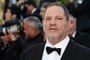 (FILES) This file photo taken on May 22, 2015 shows 
US producer Harvey Weinstein arriving for the screening of the film "The Little Prince" at the 68th Cannes Film Festival in Cannes.    
Weinstein was fired from his film studio the Weinstein Company on October 8, 2017, following reports that he sexually harassed women over several decades, according to US media. / AFP PHOTO / LOIC VENANCE