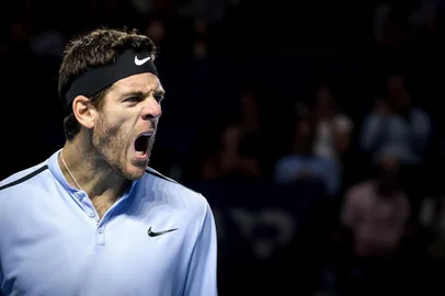 Argentina's Juan Martin Del Potro reacts after a winning point during his quarter-final game against Spain's Roberto Bautista Agut at the Swiss Indoors ATP 500 tennis tournament on October 27, 2017 in Basel. / AFP PHOTO / Fabrice COFFRINI