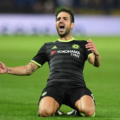 Chelseas Spanish midfielder Cesc Fábregas celebrates scoring their fourth goal during extra-time in the English League Cup third round football match between Leicester City and Chelsea at King Power Stadium in Leicester, central England on September 20, 2016. 
Anthony DEVLIN / AFP