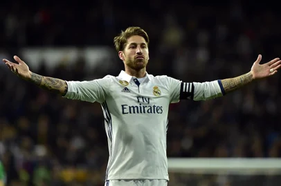  

Real Madrids defender Sergio Ramos celebrates after scoring a goal during the Spanish league footbal match Real Madrid CF vs Real Betis at the Santiago Bernabeu stadium in Madrid on March 12, 2017. / AFP PHOTO / GERARD JULIEN

Editoria: SPO
Local: Madrid
Indexador: GERARD JULIEN
Secao: soccer
Fonte: AFP
Fotógrafo: STF