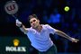 Switzerlands Roger Federer returns to Croatias Marin Cilic during their mens singles round-robin match on day five of the ATP World Tour Finals tennis tournament at the O2 Arena in London on November 16, 2017. / AFP PHOTO / Glyn KIRK